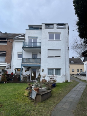 Gartenansicht - Kapitalanlage mit Entwicklungspotenzial – 2 vermietete Wohneinheiten in gepflegter 3-Parteien-WEG