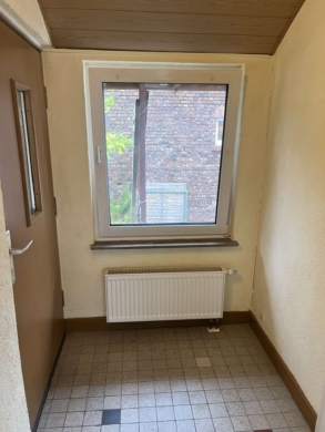 Flur - Wohnen wie im Eigenheim – Helle 3-Zimmer-Wohnung mit eigenem Garten und Garage