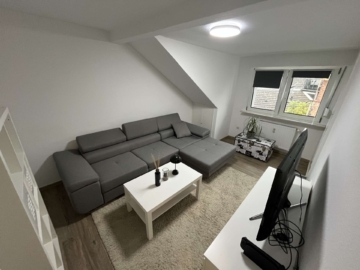 Wohnzimmer - 2-Zimmer-Dachgeschosswohnung in der Innenstadt