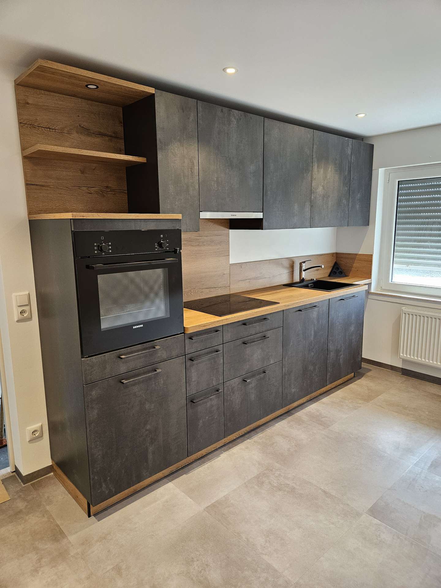 Erstbezug nach Sanierung: barrierefreie Souterrainwohnung mit PkW-Stellplatz u. Einbauküche, 53919 Weilerswist, Souterrainwohnung